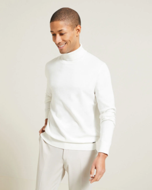 Pull col roulé blanc, en tissu doux et confortable